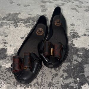 Zaxy black jelly flats with bow